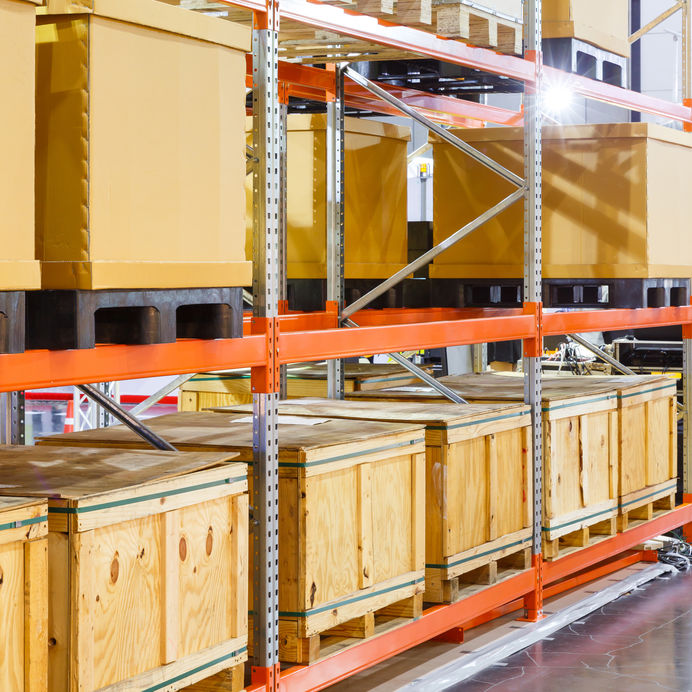 paper and wooden cargo box on steel shelf system in warehouse Bmate